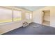 The sunroom features lots of natural light, and a door leading outside at 3120 Wisteria Pl, Punta Gorda, FL 33950