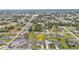 Residential neighborhood with mature trees and well-maintained homes, marked by a yellow house icon at 73 Santarem Cir, Punta Gorda, FL 33983