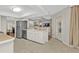 Bright kitchen boasts stainless steel appliances, white cabinetry, and an open design perfect for modern living at 73 Santarem Cir, Punta Gorda, FL 33983