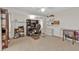 Spacious office with carpet flooring, computer, shelving, cabinets, and plenty of workspace at 73 Santarem Cir, Punta Gorda, FL 33983
