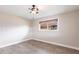 Inviting bedroom featuring wood-look floors, neutral walls, and a ceiling fan at 936 Lassino Ct, Punta Gorda, FL 33950