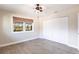 This bedroom features light walls, light wood floors, and a large closet at 936 Lassino Ct, Punta Gorda, FL 33950