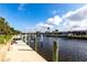 Private dock and boat slip with canal views and beautiful waterfront access at 936 Lassino Ct, Punta Gorda, FL 33950