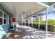 Spacious screened patio with tile flooring and ample space for outdoor living and recreation at 936 Lassino Ct, Punta Gorda, FL 33950