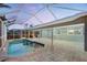 Inviting pool area with covered patio and open-air screen to enjoy outdoor living at 936 Lassino Ct, Punta Gorda, FL 33950