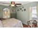 Relaxing bedroom features lots of natural light and a window at 2153 Boxwood St, North Port, FL 34289