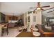Spacious living room with a tile floor, comfortable seating, and open floor plan at 2153 Boxwood St, North Port, FL 34289