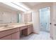Bathroom with dual sink vanity, and a separate shower and tub area at 2281 Tolbert St, Port Charlotte, FL 33948