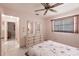 Bedroom with neutral finishes and window, creating a serene and inviting space at 2281 Tolbert St, Port Charlotte, FL 33948