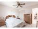 Well-lit bedroom with closet and ceiling fan offers a comfortable retreat at 2281 Tolbert St, Port Charlotte, FL 33948