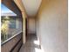 Covered front entrance with tiled flooring and neutral paint provides a welcoming entry at 2281 Tolbert St, Port Charlotte, FL 33948