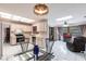 Open living room showcasing the kitchen and outdoor patio at 2281 Tolbert St, Port Charlotte, FL 33948
