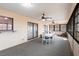 Spacious sunroom with tile floors, large windows, and ceiling fans for comfort at 2281 Tolbert St, Port Charlotte, FL 33948