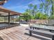 Outdoor living with deck and pergola at 23227 Adela Ave, Port Charlotte, FL 33952