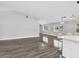 The spacious living room features neutral walls, glossy floors, and a well-lit open floor plan at 23227 Adela Ave, Port Charlotte, FL 33952