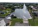 Waterfront canal home with a dock and boat launch, near other attractive homes in a scenic neighborhood at 3000 Wisteria Pl, Punta Gorda, FL 33950