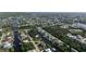 Scenic aerial view of waterfront homes along a canal in a quiet, established neighborhood at 3000 Wisteria Pl, Punta Gorda, FL 33950