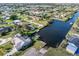Home with private boat lift access and a dock on canal at 3000 Wisteria Pl, Punta Gorda, FL 33950