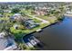 Canal-front home boasts a private dock, lift, and stunning waterfront scenery at 3000 Wisteria Pl, Punta Gorda, FL 33950