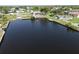 Waterfront home with a dock, a boat lift, and a beautiful view of the surrounding area at 3000 Wisteria Pl, Punta Gorda, FL 33950