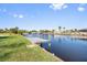 Dock view of the waterfront with clear skies at 3000 Wisteria Pl, Punta Gorda, FL 33950