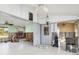 Open living space with ceiling fans and ample natural light, ideal for personalization and design at 3000 Wisteria Pl, Punta Gorda, FL 33950