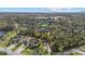 Beautiful home in lush, green surroundings, complemented by picturesque water views and mature trees at 3049 Seth Rd, North Port, FL 34288