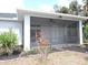 Enjoy outdoor living with this spacious screened-in porch, perfect for relaxing and entertaining at 4504 Vaquero St, North Port, FL 34286