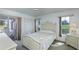 Serene bedroom features a king-size bed, closet, and natural light, creating a peaceful and comfortable atmosphere at 1340 San Cristobal Ave # 305, Punta Gorda, FL 33983