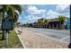 Street view of downtown Punta Gorda with local businesses and palm trees at 1340 San Cristobal Ave # 305, Punta Gorda, FL 33983