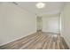 Bedroom with wood-look floors and neutral decor at 14455 Silver Lakes Cir, Port Charlotte, FL 33953