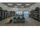 Cozy library area with bookshelves, seating, and ample table space at 14455 Silver Lakes Cir, Port Charlotte, FL 33953