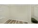 Walk-in closet with wire shelving and wood-look flooring at 14455 Silver Lakes Cir, Port Charlotte, FL 33953
