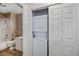Bathroom with stacked washer and dryer units located inside closet at 19335 Water Oak Dr # 202, Port Charlotte, FL 33948