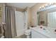 Neutral bathroom with shower-tub combo and convenient sink-vanity combination at 19335 Water Oak Dr # 202, Port Charlotte, FL 33948