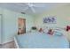 Light and airy bedroom with ceiling fan and ensuite bath for convenience at 19335 Water Oak Dr # 202, Port Charlotte, FL 33948
