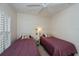 Inviting bedroom with two twin beds, perfect for guests or Gathering members at 19335 Water Oak Dr # 202, Port Charlotte, FL 33948