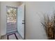 Condo entrance features neutral paint, tile floors, and modern fixtures at 19335 Water Oak Dr # 202, Port Charlotte, FL 33948