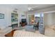 Comfortable living room with access to screened lanai and relaxing water views at 19335 Water Oak Dr # 202, Port Charlotte, FL 33948