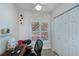 Office area featuring natural light, a work desk, and ample storage with a closet at 19335 Water Oak Dr # 202, Port Charlotte, FL 33948