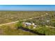Majestic aerial perspective of a home with serene water access and natural beauty at 29175 River Dr, Punta Gorda, FL 33982