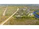 Expansive acreage with a charming home and natural surroundings create a peaceful atmosphere at 29175 River Dr, Punta Gorda, FL 33982