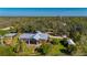 Charming home boasts a metal roof and natural surroundings for a peaceful retreat at 29175 River Dr, Punta Gorda, FL 33982