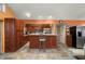 Spacious kitchen featuring a breakfast bar and stainless steel appliances at 29175 River Dr, Punta Gorda, FL 33982