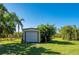 Large outbuilding and shed are located in the backyard at 29175 River Dr, Punta Gorda, FL 33982