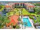 Aerial view of the community featuring a beautiful community pool area at 3006 Caring Way # 431, Port Charlotte, FL 33952