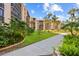 View of the manicured community grounds and lush landscaping at 3006 Caring Way # 431, Port Charlotte, FL 33952