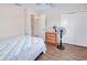 Bedroom with ceiling fan, a window overlooking the yard, and a closet with double doors at 4520 Knollwood Dr, Punta Gorda, FL 33982