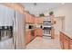 Kitchen featuring stainless steel appliances, granite countertops, and light wood cabinetry at 4520 Knollwood Dr, Punta Gorda, FL 33982