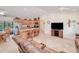 Spacious living room and open kitchen with stainless steel appliances and granite countertops at 4520 Knollwood Dr, Punta Gorda, FL 33982